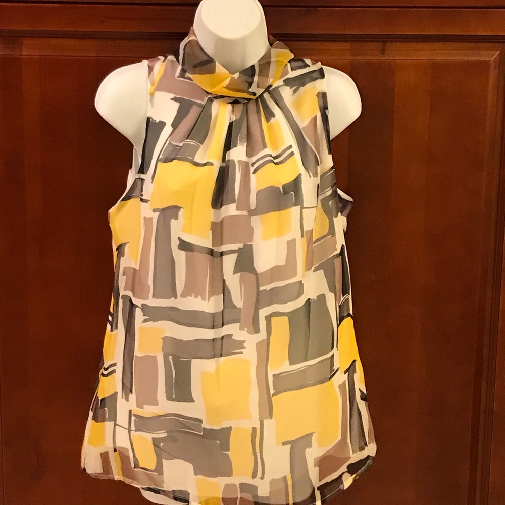 Multi-colored sleeveless blouse.